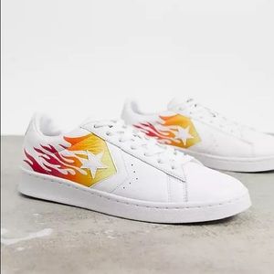 MENS size 7.5, WOMENS size 9 white flame pro leather ox sneakers.
